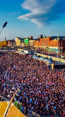 Aerial image showing a crowd of people at a festival