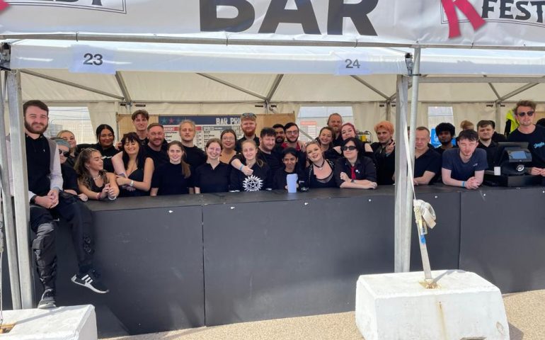 Image showing a group of Viking Staffing & Events staff behind the bar at R Fest smiling